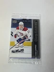 2021-22 Upper Deck Factory Set Cello Sealed Cole Caufield Young Guns Front. Fixed Price $124.99.