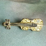 Vintage Goldtone Metal Musical Instrument Violin Yellow & Clear Gems Brooch Pin. Fixed Price $15.00.
